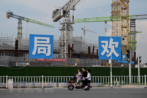 Thêm 1 tháng cho 'ông lớn' Evergrande lên kế hoạch tái cơ cấu nợ- Ảnh 1. Một công trình xây dựng của Tập đoàn bất động sản Evergrande ở Quảng Châu, tỉnh Quảng Đông, Trung Quốc - Ảnh: AFP