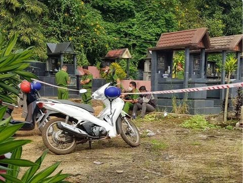 Vụ tranh chấp tử thi không có dấu hiệu hình sự- Ảnh 1. Cơ quan công an phải khai quật mộ để giải quyết vụ tranh chấp tử thi - Ảnh: TX
