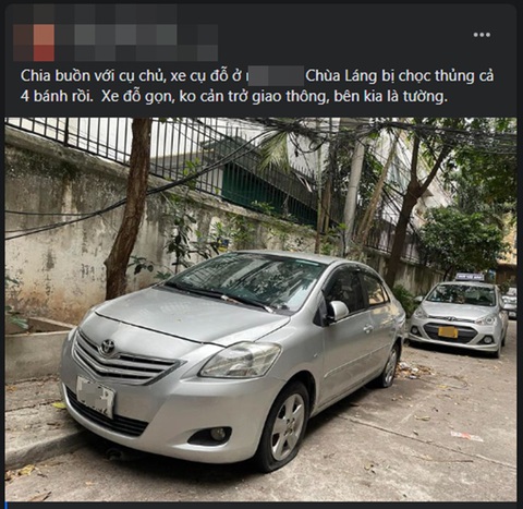 Đỗ xe gọn gàng vẫn bị xì lốp, cộng đồng mạng tranh cãi- Ảnh 1. Hình ảnh chiếc xe đỗ gọn gàng bị xì lốp gây xôn xao cộng đồng mạng - Ảnh chụp màn hình