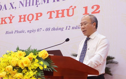 Bình Phước ứng dụng trí tuệ nhân tạo nắm thông tin trên Facebook và YouTube- Ảnh 1. Ông Nguyễn Minh Quang, giám đốc Sở Thông tin và Truyền thông tỉnh Bình Phước, trả lời tại phiên chất vấn - Ảnh: AN BÌNH