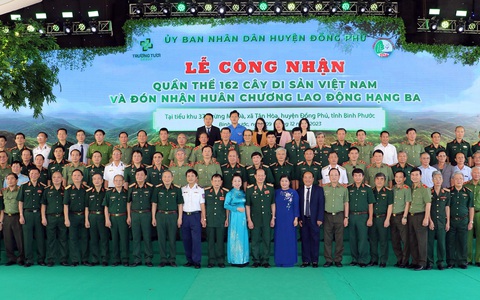 Cây kơ nia cổ thụ 1.230 tuổi trong rừng Mã Đà được công nhận Cây di sản Việt Nam- Ảnh 1. Bình Phước long trọng tổ chức lễ công nhận quần thể 162 Cây di sản Việt Nam trong rừng Mã Đà - Ảnh: NAM HÀ