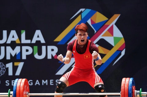 Lực sĩ Trịnh Văn Vinh trở lại sau 4 năm bị cấm thi đấu vì doping - Ảnh 1. Lực sĩ Trịnh Văn Vinh trở lại sau 4 năm bị cấm thi đấu vì doping - Ảnh 1.
