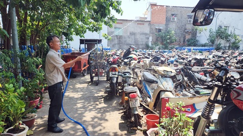 Hàng nghìn xe vi phạm, xe tang vật phơi mưa nắng đến biến dạng tại TP.HCM - Ảnh 6. Hàng nghìn xe vi phạm, xe tang vật phơi mưa nắng đến biến dạng tại TP.HCM - Ảnh 6.