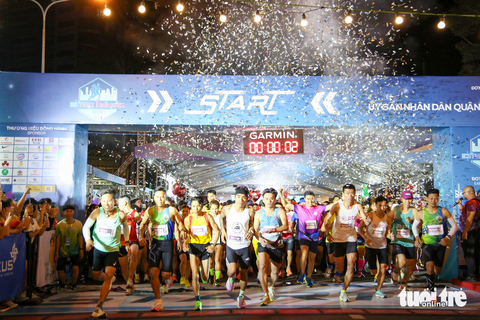 4.000 người chạy đêm giải District 1 Midnight Run ở trung tâm TP.HCM - Ảnh 1. 4.000 người chạy đêm giải District 1 Midnight Run ở trung tâm TP.HCM - Ảnh 1.