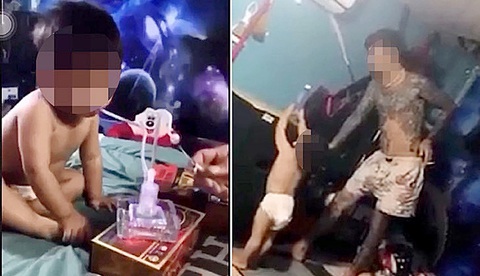 Cha mẹ làm gì khi con bị người lạ dụ dỗ, ép buộc hút ma túy đá? - Ảnh 1. Một bé trai nghi bị người lớn cho hút ma túy đá. Hình ảnh cắt từ một số đoạn video clip chia sẻ trên mạng xã hội