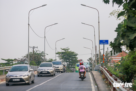 Những cây cầu trọng điểm ở TP.HCM nằm trơ xương chưa biết khi nào hoàn thành - Ảnh 10. Những cây cầu trọng điểm ở TP.HCM nằm trơ xương chưa biết khi nào hoàn thành - Ảnh 10.