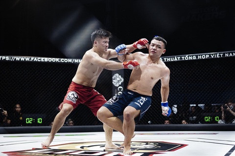 Trần Quang Lộc hạ knock-out Lý Tiểu Long ngay hiệp 1 - Ảnh 7. Trần Quang Lộc hạ knock-out Lý Tiểu Long ngay hiệp 1 - Ảnh 7.