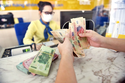Tín dụng tăng chậm, ngân hàng lo lỗ - Ảnh 1. Tín dụng tăng chậm, ngân hàng lo lỗ - Ảnh 1.