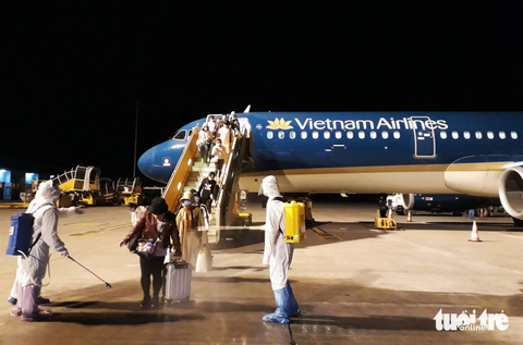 Hành khách trong chuyến bay giải cứu từ Philippines về Việt Nam tháng 3-2020 - Ảnh: KHƯƠNG XUÂN Hành khách trong chuyến bay giải cứu từ Philippines về Việt Nam tháng 3-2020 - Ảnh: KHƯƠNG XUÂN