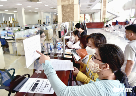 Giảm gánh nặng thuế thu nhập cá nhân - Ảnh 1. Giảm gánh nặng thuế thu nhập cá nhân - Ảnh 1.