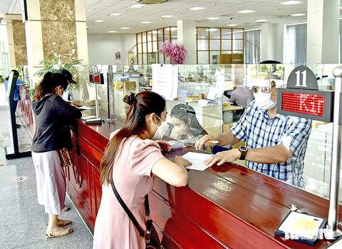 Giảm gánh nặng thuế thu nhập cá nhân - Ảnh 4. Giảm gánh nặng thuế thu nhập cá nhân - Ảnh 4.