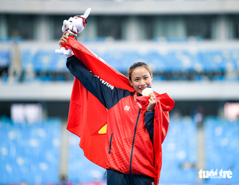 Vẻ đẹp thiên thần của các nữ VĐV điền kinh Việt Nam tại SEA Games 32 - Ảnh 6. Vẻ đẹp thiên thần của các nữ VĐV điền kinh Việt Nam tại SEA Games 32 - Ảnh 6.