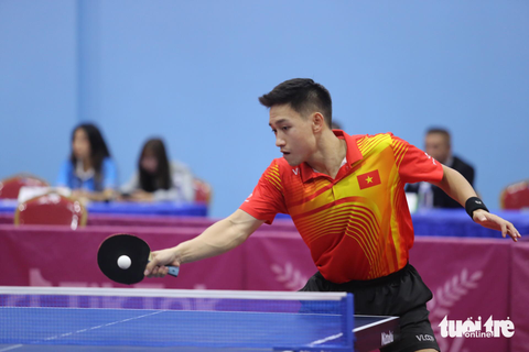 SEA Games ngày 16-5: Quốc Toàn đoạt HCV đầu tiên, phá 3 kỉ lục SEA Games - Ảnh 3. Anh Tú đã giành quyền vào chung kết đơn nam - Ảnh: ĐỨC KHUÊ
