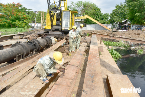 TP.HCM phải chống ngập kiểu... ít tiền - Ảnh 1. TP.HCM phải chống ngập kiểu... ít tiền - Ảnh 1.