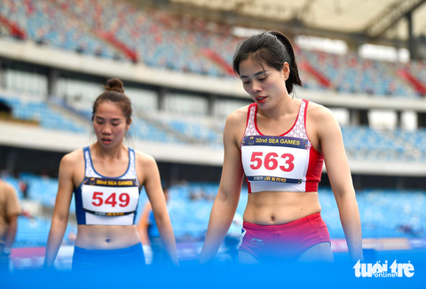 SEA Games: Nguyễn Thị Huyền 'tụt mất' HCV 400m - Ảnh 3. Nguyễn Thị Huyền đã không thể bảo vệ thành công tấm HCV nội dung 400m nữ - Ảnh: NAM TRẦN
