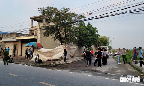 Thi thể trong bao tải đặt trên vỉa hè là người phụ nữ có 2 con nhỏ - Ảnh 3. Thi thể trong bao tải đặt trên vỉa hè là người phụ nữ có 2 con nhỏ - Ảnh 3.
