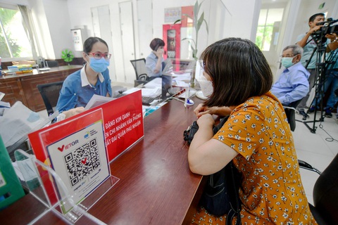 Mã thanh toán không tiền mặt tại UBND quận Phú Nhuận, TP.HCM vào chiều 14-6 - Ảnh: QUANG ĐỊNH Mã thanh toán không tiền mặt tại UBND quận Phú Nhuận, TP.HCM vào chiều 14-6 - Ảnh: QUANG ĐỊNH