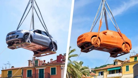 Giám đốc Fiat ngồi trong xe nhúng vào thùng sơn khổng lồ - Ảnh 1. Giám đốc Fiat ngồi trong xe nhúng vào thùng sơn khổng lồ - Ảnh 1.