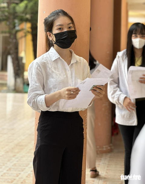Thí sinh chuẩn bị làm thủ tục dự thi - Ảnh: TRUNG TÂN Thí sinh chuẩn bị làm thủ tục dự thi - Ảnh: TRUNG TÂN