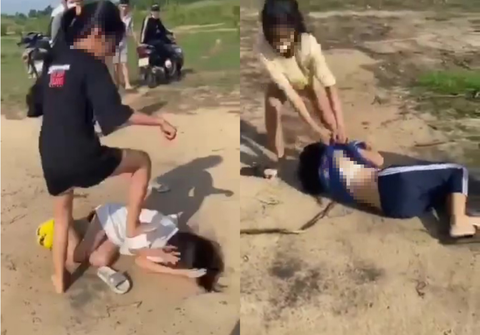 Hai nữ sinh ở TP Thủ Đức bị đánh hội đồng, xé áo, quay video - Ảnh 1.