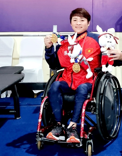 Niềm vui của chị Tuyết Loan khi phá kỷ lục tại ASEAN Para Games 12 - Ảnh: THÁI DƯƠNG Niềm vui của chị Tuyết Loan khi phá kỷ lục tại ASEAN Para Games 12 - Ảnh: THÁI DƯƠNG