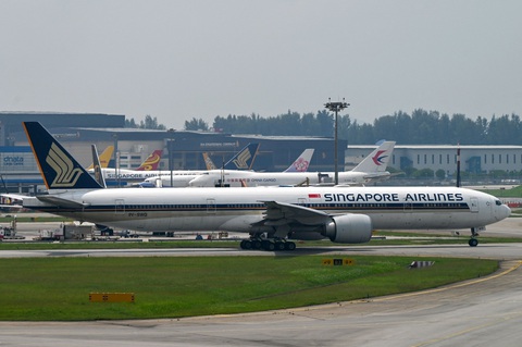 Hãng hàng không Singapore Airlines phát Wifi miễn phí cho tất cả hành khách - Ảnh 1. Máy bay của hãng hàng không Singapore Airlines tại Sân bay Changi. Ảnh: afp.com