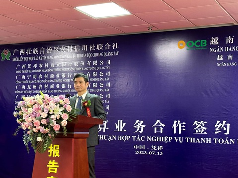 OCB ký kết hợp tác thanh toán biên mậu - Ảnh 1. Ông Nguyễn Văn Hương - Phó Tổng Giám đốc OCB - phát biểu tại lễ ký kết thỏa thuận hợp tác với Khối liên hợp Hợp tác xã tín dụng nông thôn khu tự trị dân tộc Choang Quảng Tây - Ảnh: OCB