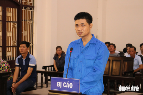 Tuyên phạt 18 năm tù vì ghen tuông tình ái giết vợ - Ảnh 1. Bị cáo Nguyễn Quốc Thanh bị tuyên phạt 18 năm tù về tội "giết người" - Ảnh: HOÀI THƯƠNG