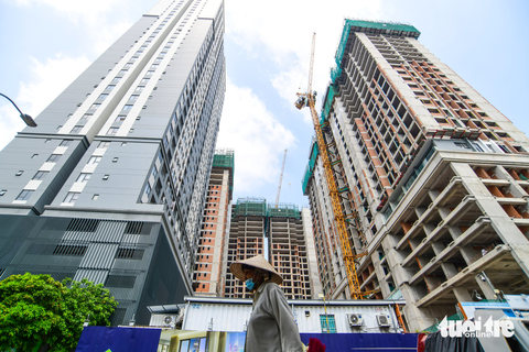 Novaland hoãn thanh toán lãi lô trái phiếu 300 triệu USD - Ảnh 1. Novaland cho hay những diễn biến tiêu cực của tình hình kinh tế chung đã tác động đến tính thanh khoản của doanh nghiệp này. Trong ảnh: Một dự án do Novaland phát triển tại TP.HCM - Ảnh: QUANG ĐỊNH