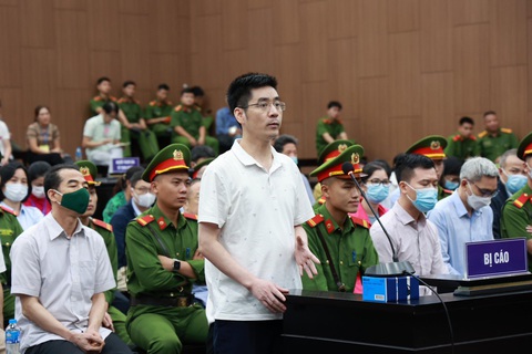 Hoàng Văn Hưng - Ảnh 1. Cựu điều tra viên Hoàng Văn Hưng tại phiên tòa vụ chuyến bay giải cứu - Ảnh: NAM PHƯƠNG