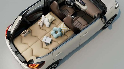 Xe Wuling tí hon mới có thể biến thành giường, phòng ăn di động - Ảnh 3. Toàn bộ khu vực sau hàng ghế trước có thể dễ dàng chuyển thành giường cho người dùng ngả lưng - Ảnh: Wuling