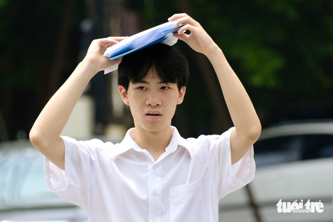 Trường đại học Kinh tế Quốc dân công bố điểm chuẩn xét tuyển sớm - Ảnh 1. Thí sinh tham dự kỳ thi đánh giá của Bộ Công an - Ảnh: NGUYÊN BẢO