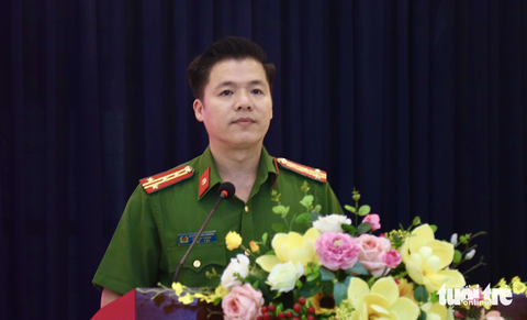 Thiết bị bay không người lái sẽ 'trình diễn' tại triển lãm phòng cháy chữa cháy - Ảnh 1. Đại tá Nguyễn Minh Khương - phó cục trưởng Cục C07 - thông tin tại cuộc họp - Ảnh: DANH TRỌNG
