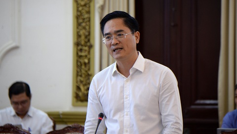 Các địa phương muốn kéo dài metro về Đồng Nai, Bình Dương - Ảnh 1. Giám đốc Sở Giao thông vận tải TP.HCM Trần Quang Lâm báo cáo tại hội nghị - Ảnh: H.K.