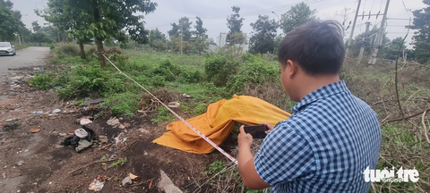Hiện trường nơi phát hiện tứ chi của người đàn ông bị phân xác tại TP Tân Uyên, Bình Dương - Ảnh: BÁ SƠN Hiện trường nơi phát hiện tứ chi của người đàn ông bị phân xác tại TP Tân Uyên, Bình Dương - Ảnh: BÁ SƠN