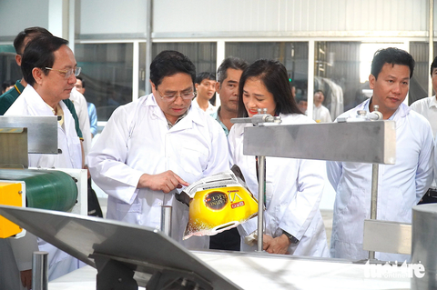 Thủ tướng Chính phủ yêu cầu tập trung xây dựng thương hiệu và vùng nguyên liệu lúa gạo - Ảnh 2. Thủ tướng lưu ý các doanh nghiệp trong lĩnh vực lúa gạo cần tập trung xây dựng thương hiệu - Ảnh: MẬU TRƯỜNG