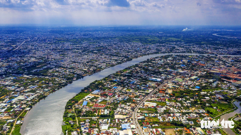 Sông Sài Gòn đoạn qua quận 12 (TP.HCM) và TP Thuận An (tỉnh Bình Dương) - Ảnh: QUANG ĐỊNH Sông Sài Gòn đoạn qua quận 12 (TP.HCM) và TP Thuận An (tỉnh Bình Dương) - Ảnh: QUANG ĐỊNH