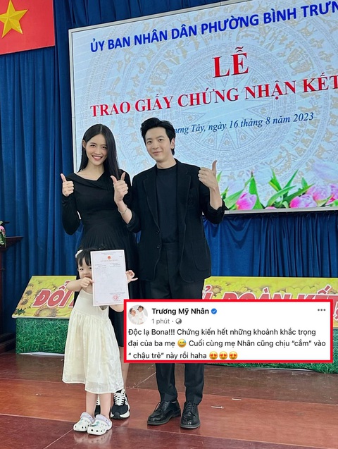 Trương Mỹ Nhân - Phí Ngọc Hưng khoe giấy kết hôn, chính thức về chung nhà - Ảnh 1. Trương Mỹ Nhân - Phí Ngọc Hưng thông báo kết hôn với "nhân chứng đặc biệt" là con gái Bona