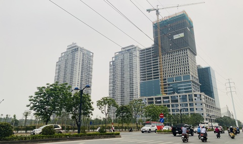 Chung cư trăm triệu một m2, giá nhà ngày càng xa tầm với người dân - Ảnh 1. Bộ Xây dựng cho biết giá chung cư tại Hà Nội, TP.HCM tiếp tục tăng trong quý 2 năm nay - Ảnh: B.NGỌC