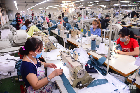 Công nhân làm việc tại một công ty dệt may xuất khẩu ở TP Thủ Đức, TP.HCM - Ảnh: QUANG ĐỊNH Công nhân làm việc tại một công ty dệt may xuất khẩu ở TP Thủ Đức, TP.HCM - Ảnh: QUANG ĐỊNH