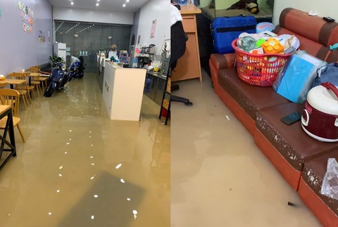Điện Biên Phủ ngập sâu cả mét sau mưa lớn, nước tràn vào hàng loạt nhà dân - Ảnh 6. Nhiều nhà dân, hộ kinh doanh ở hai bên đường Võ Nguyên Giáp bị nước tràn vào nhà - Ảnh: THU HẰNG