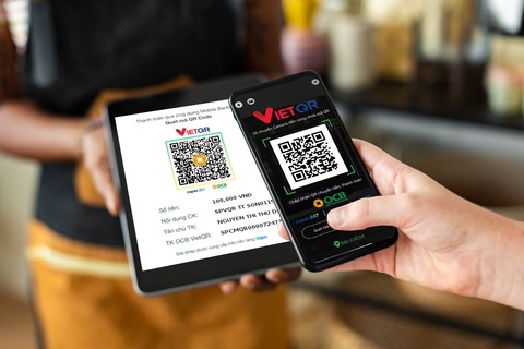 Giao dịch thanh toán an toàn bằng mã QR động - Ảnh 1. Thanh toán thẳng bằng mã QR động của ngân hàng là một phương thức hữu hiệu giúp người dân tránh “mất tiền oan" - Ảnh: OCB