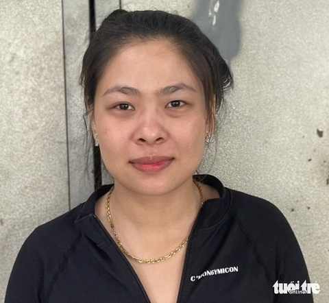 Tạm giữ 5 đối tượng bắt người trái phép - Ảnh 2. Trần Thị Hạnh (vợ Tuấn) - Ảnh: MINH PHƯỚC