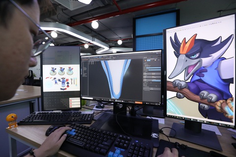 Bàn làm việc của một họa sĩ vẽ nhân vật trong game tại VNGGames. Trong những năm gần đây, VNGGames không ngừng phát triển với sự đóng góp tổng doanh thu đến từ cả thị trường Việt Nam và quốc tế, để lại dấu ấn mạnh mẽ với tầm nhìn vươn ra toàn cầu kể từ năm 2020. - Ảnh: ĐỨC THIỆN Bàn làm việc của một họa sĩ thiết kế nhân vật trong game tại VNGGames - Ảnh: ĐỨC THIỆN