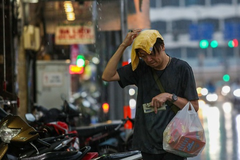 Thời tiết hôm nay 15-9: Bắc Bộ giảm mưa lớn, Nam Bộ mưa nhiều nơi - Ảnh 1. Hôm nay thời tiết Nam Bộ về chiều tiếp tục mưa to - Ảnh: PHƯƠNG QUYÊN