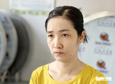Bắt tạm giam chủ nhà trẻ không phép có bé trai 2 tuổi tử vong - Ảnh 1. Chủ nhà trẻ không phép Phan Ngọc Minh Thư bị bắt tạm giam với cáo buộc "vô ý làm chết người do vi phạm quy tắc nghề nghiệp" - Ảnh: TIẾN VĂN