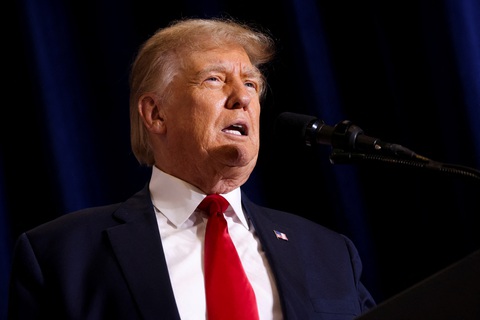 Cựu tổng thống Mỹ Donald Trump - Ảnh: REUTERS Ông Trump đã bị truy tố 4 lần với 91 cáo buộc hình sự - Ảnh: REUTERS