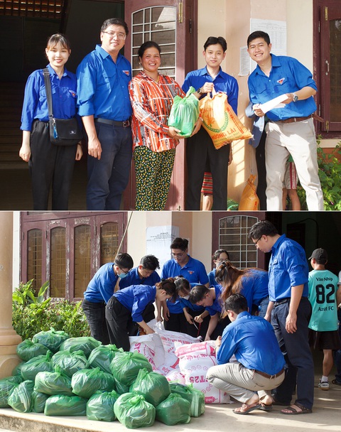 Hoạt động tình nguyện hiến máu nhân đạo và khám chữa răng miệng miễn phí của ĐH Duy Tân - Ảnh 3. Cán bộ, giảng viên và sinh viên trao quà cho người dân