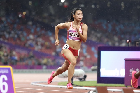 Cơ hội của Minh Hạnh - Ảnh 1. Hoàng Thị Minh Hạnh thi đấu vòng loại 400m nữ vào tối 29-9 - Ảnh: ĐỨC KHUÊ