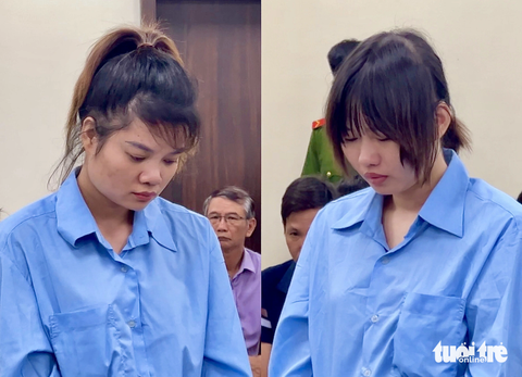 Nước mắt ba người phụ nữ trong phiên xử hai bảo mẫu bạo hành bé trai 17 tháng tuổi tử vong - Ảnh 1. Bị cáo An (trái) và Lành tại tòa - Ảnh: DANH TRỌNG